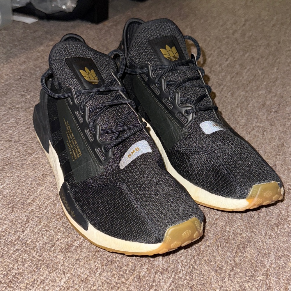 adidas Black and Gold NMD Sneakers